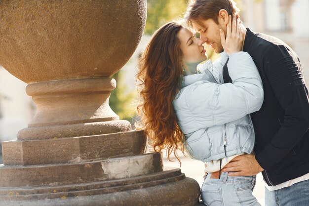 Beautiful couple spend time in a spring city