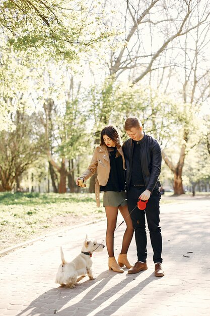 Beautiful couple spend time in a spring park