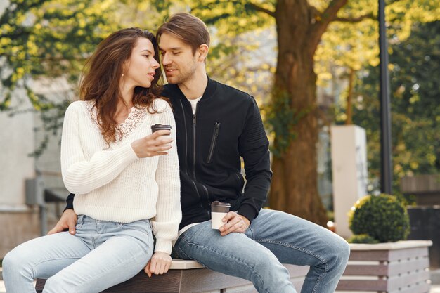 Beautiful couple spend time in a spring park