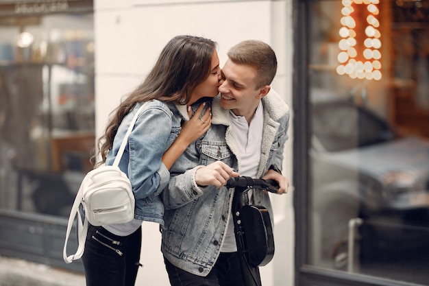 Beautiful couple spend time in the street