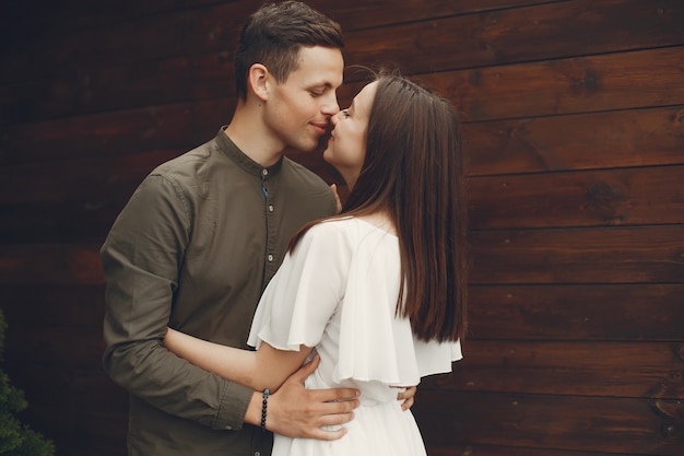 Beautiful couple spend time in a summer city