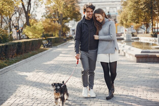 Beautiful couple spend time in a summer city