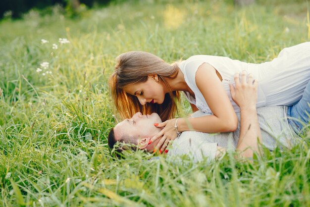 Beautiful couple spend time in a summer city