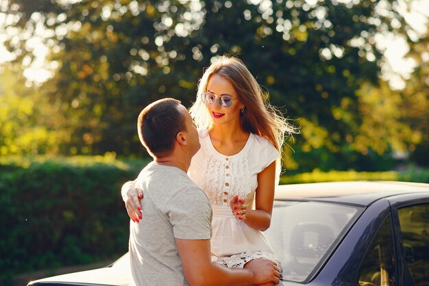 Beautiful couple spend time in a summer city