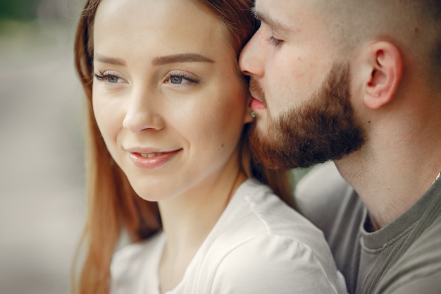 Free photo beautiful couple spend time on a summer forest