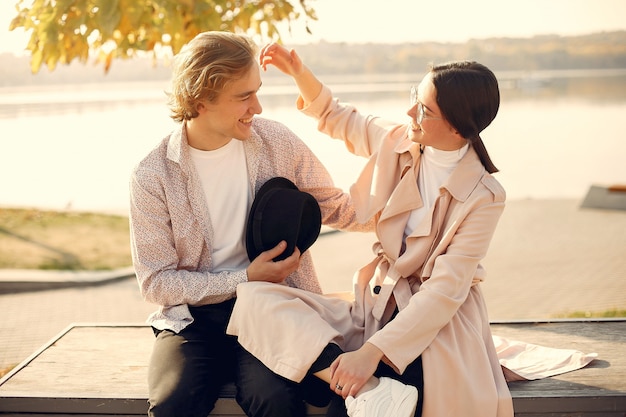 Beautiful couple spend time on a summer forest