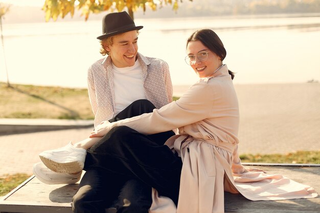 Beautiful couple spend time on a summer forest