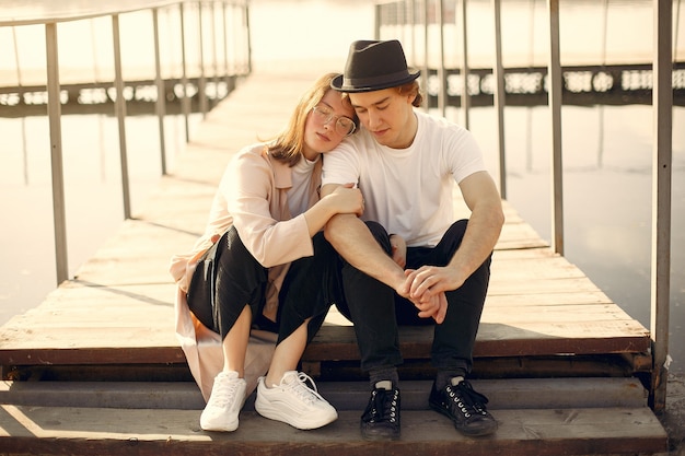 Beautiful couple spend time on a summer park