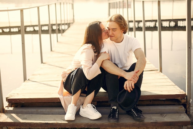 Beautiful couple spend time on a summer park