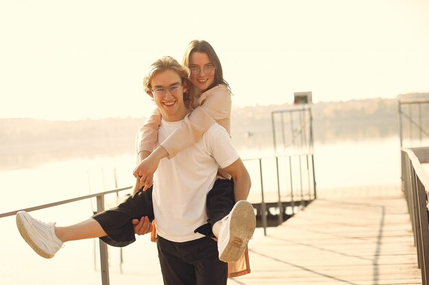 Beautiful couple spend time on a summer park