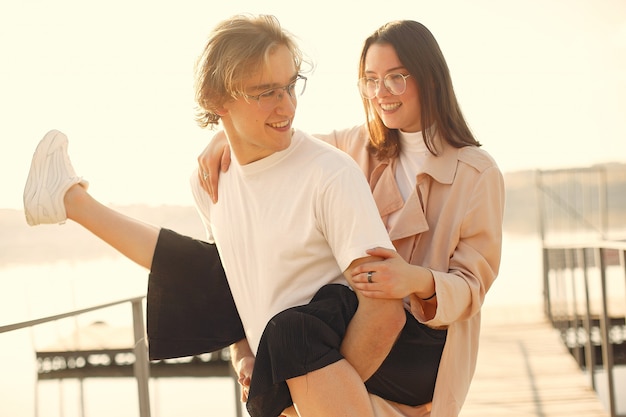 Beautiful couple spend time on a summer park