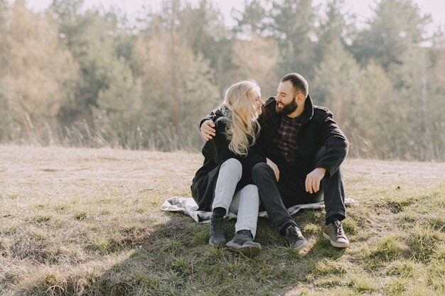 Beautiful couple spend time in a wheat field