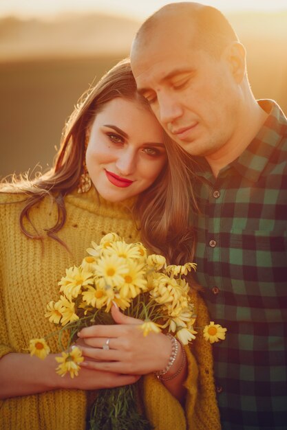 beautiful couple spends time in an autumn park 