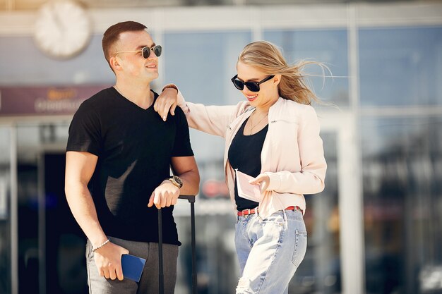 Beautiful couple standing in airport