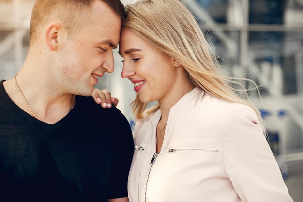 Beautiful couple standing in airport