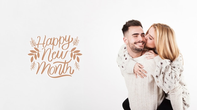 Beautiful couple with happy new month lettering