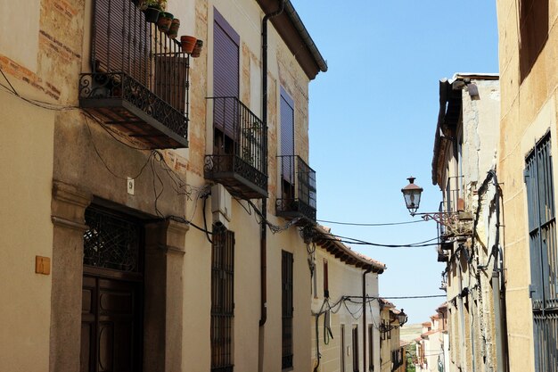 Beautiful daytime picture of a narrow street and short buildings