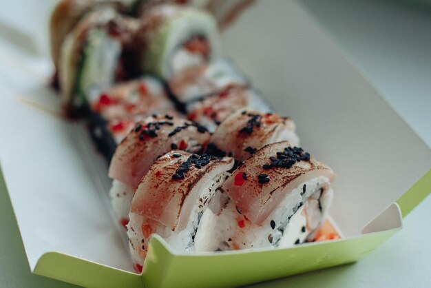 Beautiful delicious sushi Sushi delivery Advertising sushi rolls made of fish and cheese