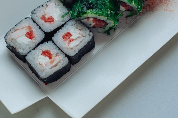 Beautiful delicious sushi Sushi delivery Advertising sushi rolls made of fish and cheese