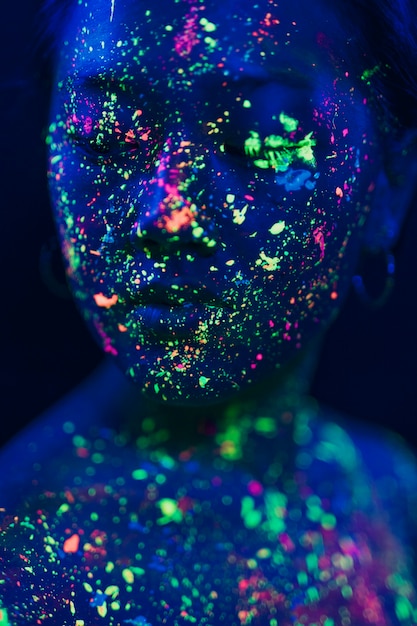 Free photo beautiful design of uv paint make-up