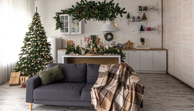 Beautiful details of Christmas decor in the interior of a modern kitchen.