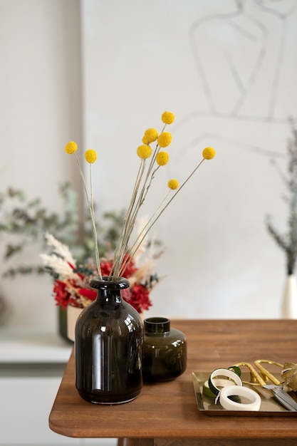 Beautiful dried flowers on table