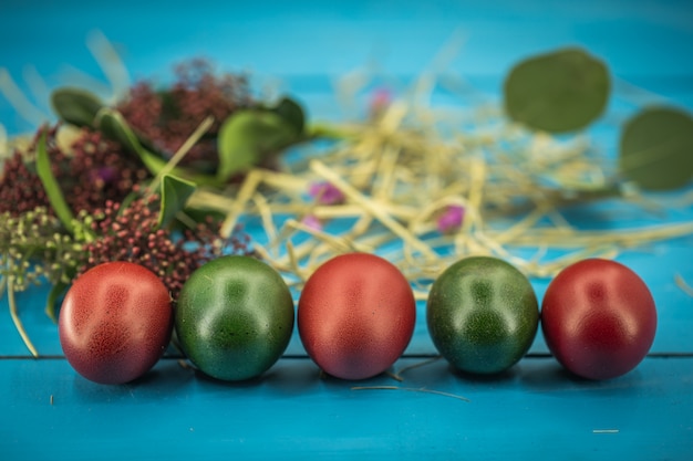 Beautiful easter eggs on a blue wood, easter concept