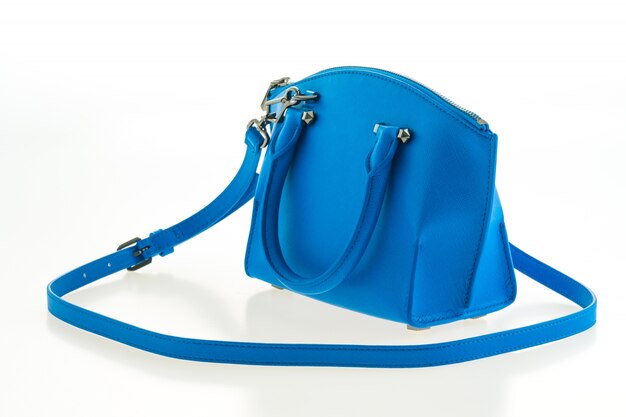 美しいエレガンスと高級ファッション女性とブルーのハンドバッグ