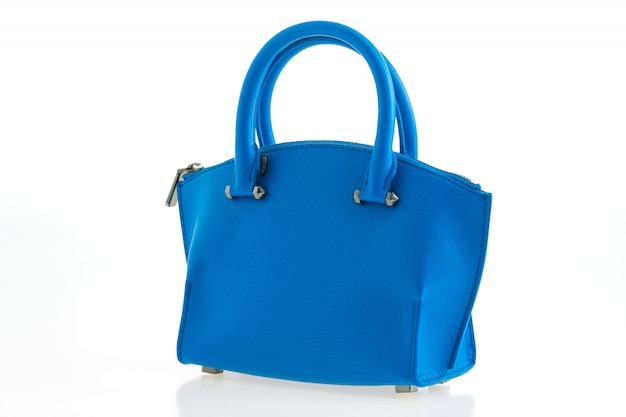 美しいエレガンスと高級ファッション女性とブルーのハンドバッグ