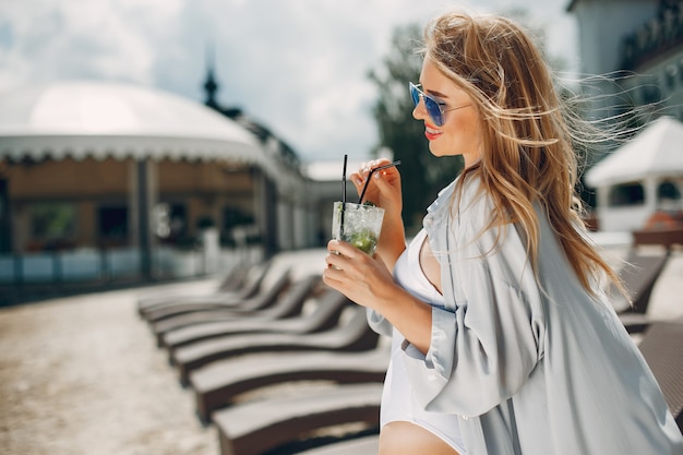 Beautiful and elegant girl on a resort