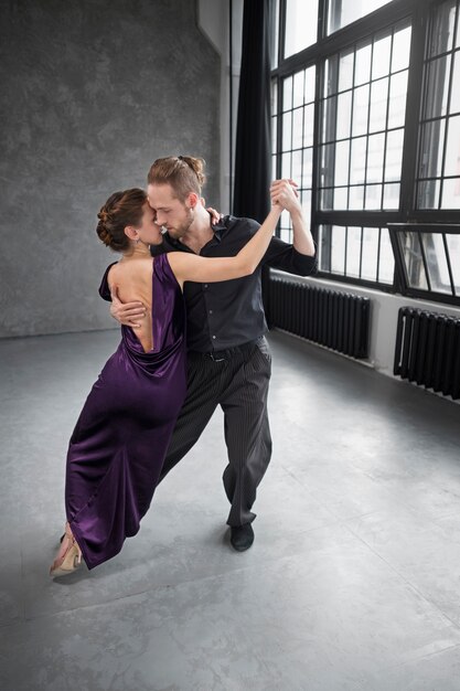 Beautiful elegant people dancing tango