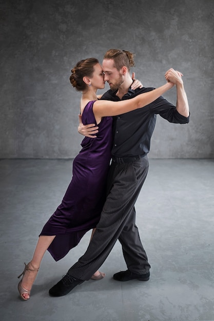 Beautiful elegant people dancing tango