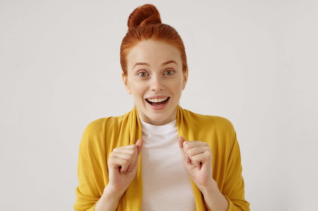 Download Free Stock Photo: Astonished European Woman with Hair Knot