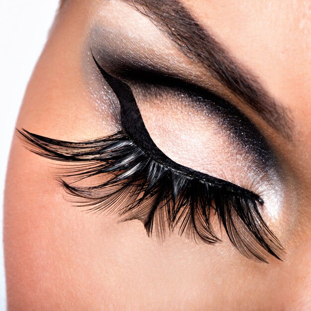 Beautiful Eye Makeup with long false eyelashes. Holiday visage