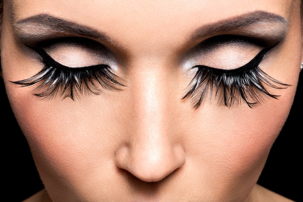 Beautiful Eye Makeup with long false eyelashes. Holiday visage