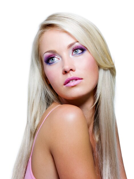 Beautiful face with satured colors of make-up and straight long hair