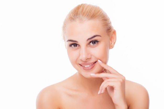 Beautiful face of young adult woman with clean fresh skin