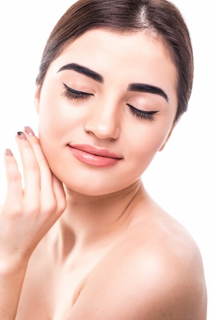 Beautiful Face of Young Woman with Clean Fresh Skin close up isolated on white. Beauty Portrait. skincare and cosmetology concept