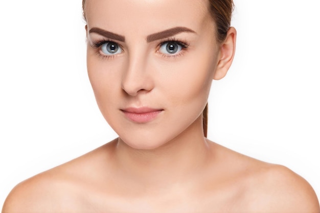 Beautiful Face of Young Woman with Clean Fresh Skin