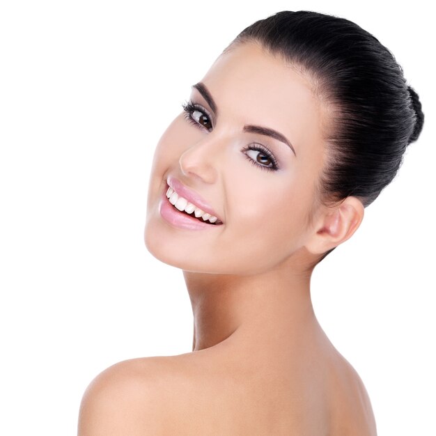 Beautiful face of young woman with clean fresh skin