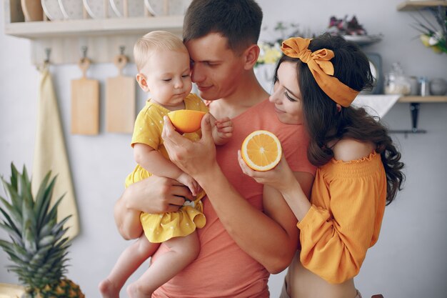 Beautiful family prepare food in a kitchen