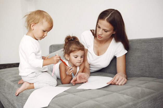 Beautiful family spend time in a bathroom