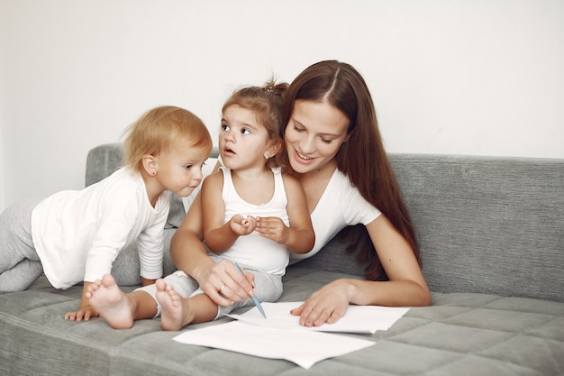 Beautiful family spend time in a bathroom