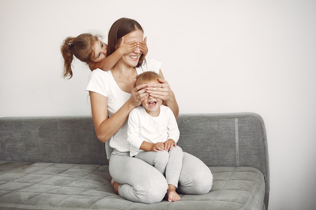 Beautiful family spend time in a bathroom