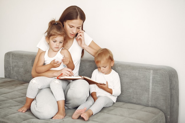 Beautiful family spend time in a bathroom