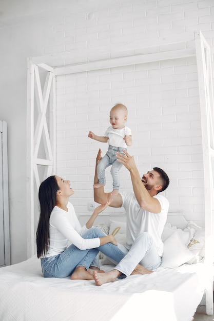 Beautiful family spend time in a bathroom
