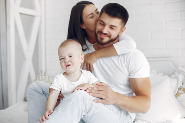 Beautiful family spend time in a bathroom