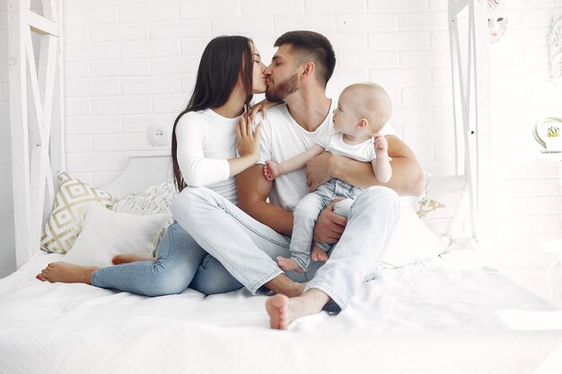 Beautiful family spend time in a bathroom