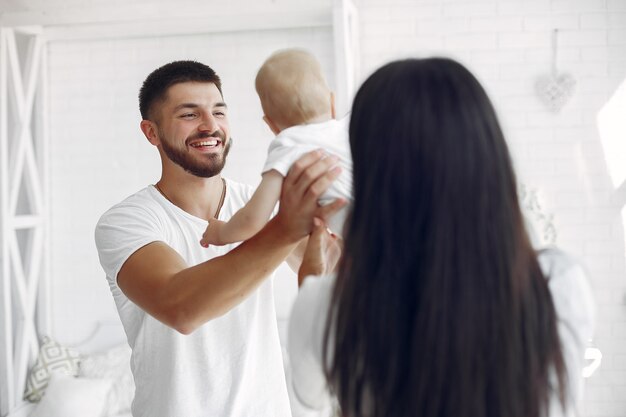 Beautiful family spend time in a bathroom