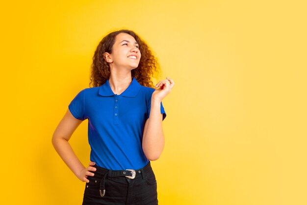 Beautiful female curly model in shirt